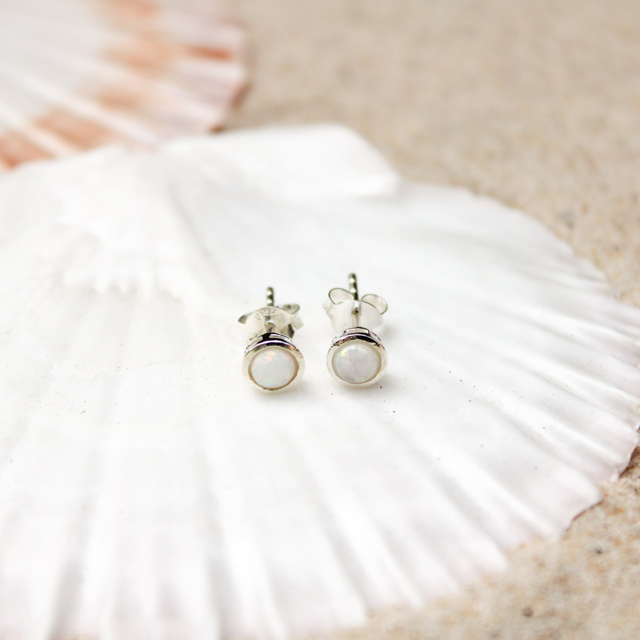 White opal stud earrings